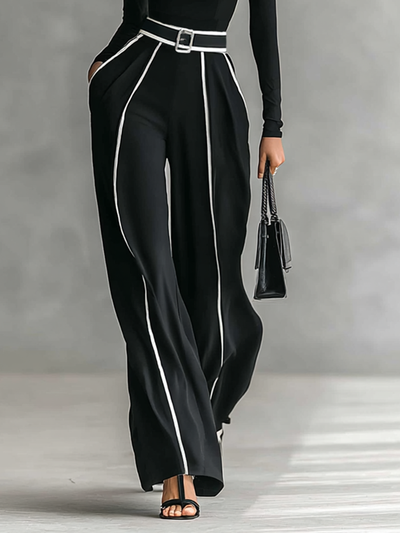 Two-piece women’s set with high-neck long-sleeve top, wide-leg trousers, and belt